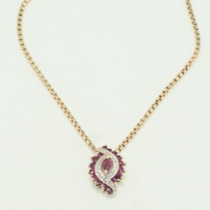 Yellow gold ruby and diamond marquise cluster necklace