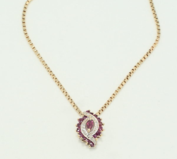 Yellow gold ruby and diamond marquise cluster necklace