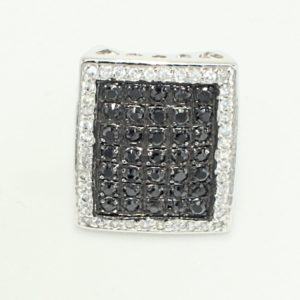 Oversized rectangular multi black crystal center with white crystal halo ring.