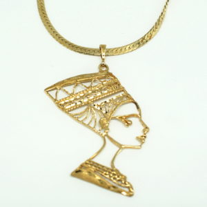 Yellow gold open worked Cleopatra pendant on yelloa herringbone chain