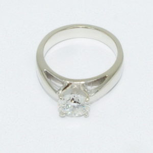 White solitaire engagement ring alternate view.