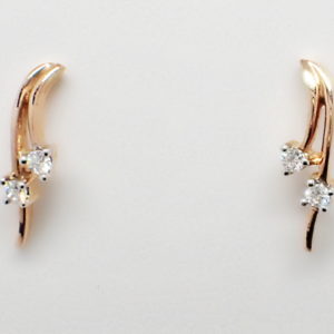 Rose gold double swoop earring set with two diamonds in each.