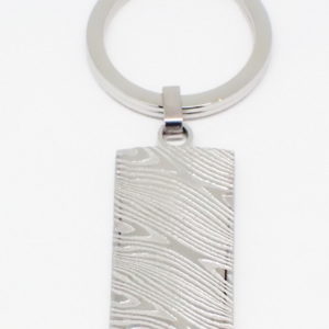 Josef Elias rectangular domed front Damascus steel key chain.